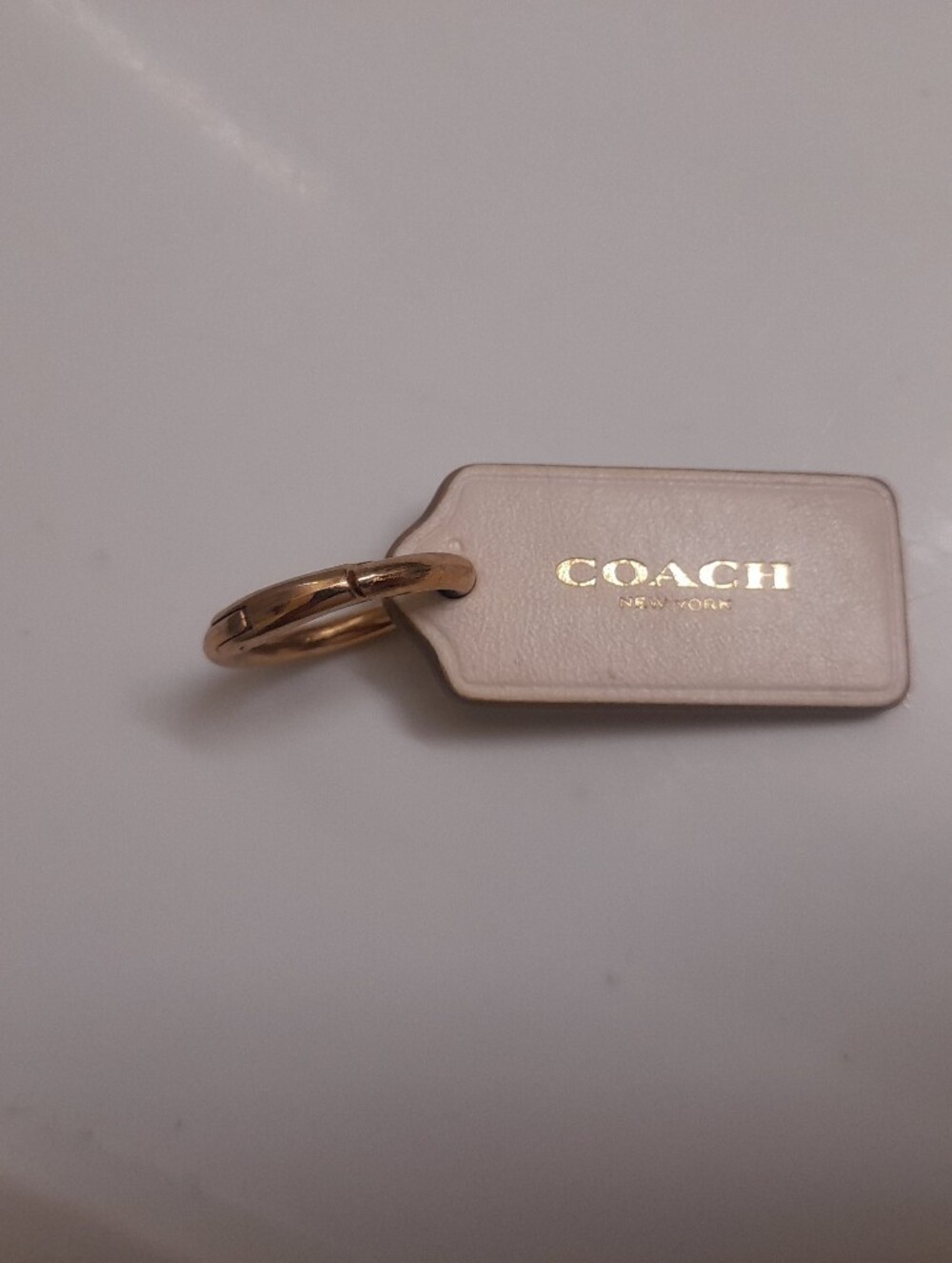 Coach Cream Leather Tag with Gold Logo Bag Charm